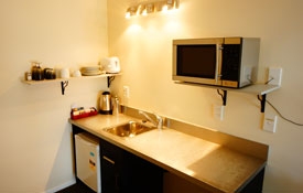 kitchenette with fridge and micrwave